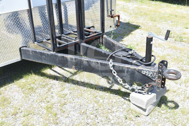 2021 Diamond Cargo 8.5x24 food trailer hitch, showing VIN 89857. Sturdy construction with chain and handle visible.
