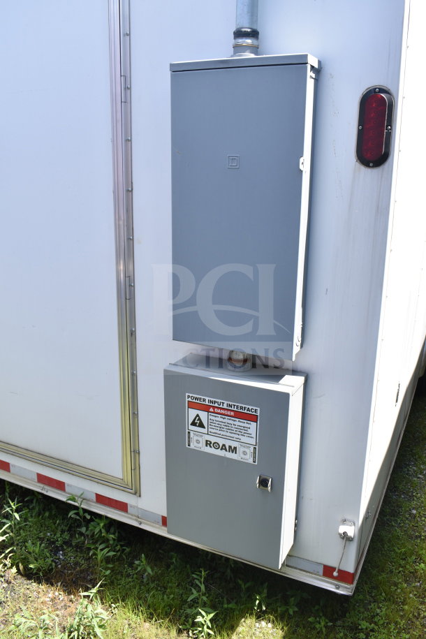 2021 Diamond Cargo 8.5x24 food trailer, power input interface visible. Features grease hood, fire system, range.