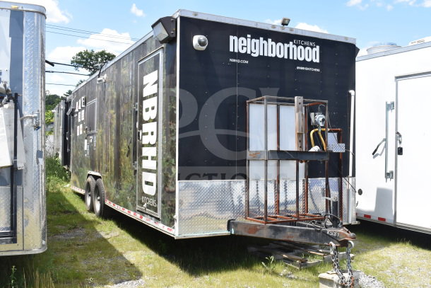 2020 Diamond Cargo 8.5x24 food trailer, black exterior, "neighborhood kitchens" branding, VIN 53NBE2427L1083687.