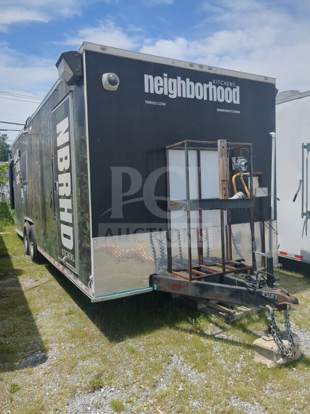 2020 Diamond Cargo 8.5x24 food trailer, black exterior, "Neighborhood Kitchens" branding, good condition, VIN 53NBE2427L1083687.