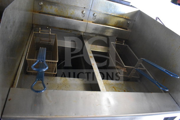 2020 Diamond Cargo food trailer fryer, dual baskets, visible grease and wear, part of fully outfitted kitchen. VIN 53NBE2427L1083687.
