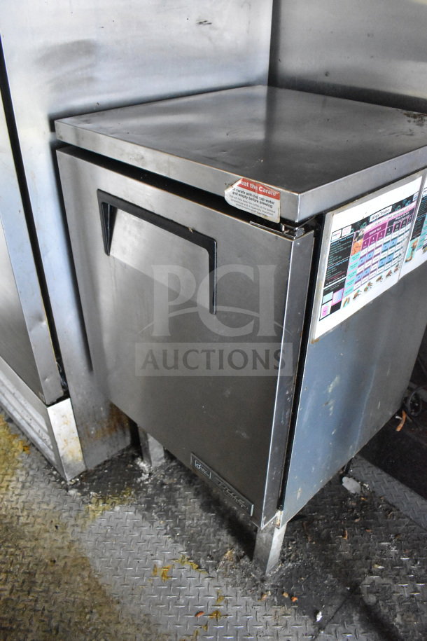 2020 Diamond Cargo 8.5x24 food trailer interior showing stainless steel refrigeration unit, some wear visible.