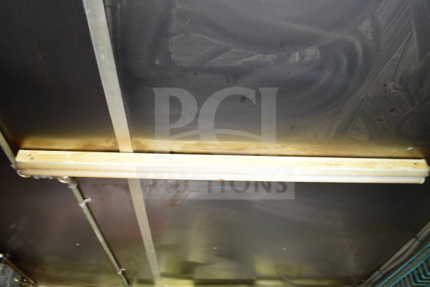 Interior of a 2020 Diamond Cargo 8.5x24 food trailer showing ceiling with visible wiring and light fixture.