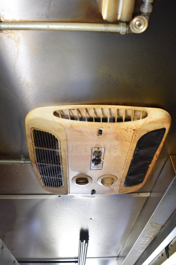 2020 Diamond Cargo 8.5x24 food trailer ceiling with ventilation hood. Features grease hood and piping. VIN 53NBE2427L1083687.