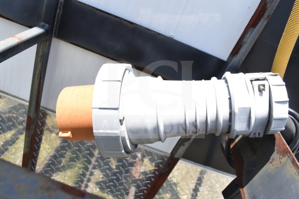 Close-up of cable connection on a 2020 Diamond Cargo 8.5x24 food trailer. Features grease hood, fryer, and refrigeration.