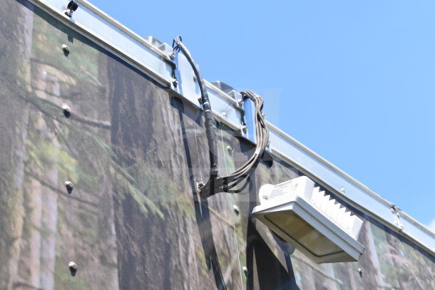 2020 Diamond Cargo 8.5x24 food trailer exterior with mounted light fixture and wiring.