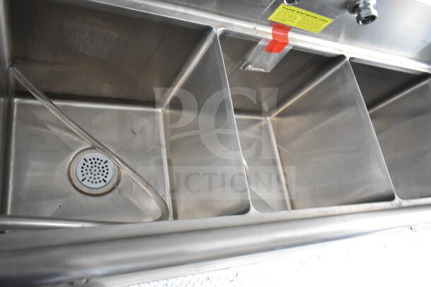 Stainless steel three-compartment sink in 2020 Ford F59 food truck, features grease hood, suppression system, Pitco fryer.