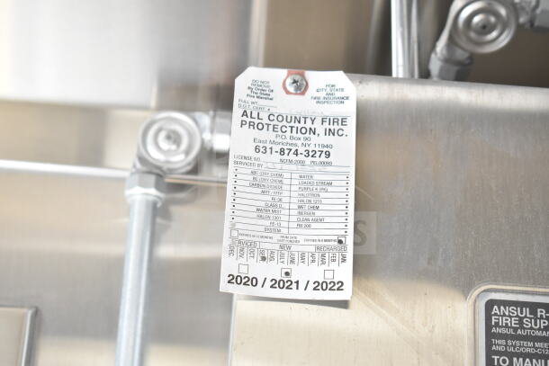 All County Fire Protection tag on 2020 Ford F59 food truck, detailing service and inspection information from 2020 to 2022.