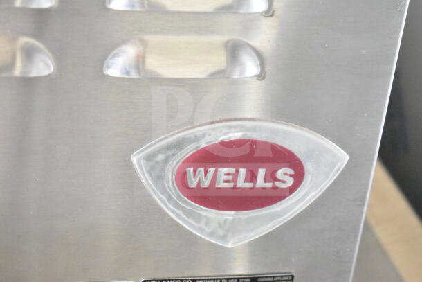 2020 Ford F59 Food Truck with Wells appliance logo on stainless steel, featuring grease hood and Pitco fryer. VIN: 1F66F5KN8L0A07302.
