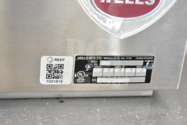 Label plate on a 2020 Ford F59 Food Truck with details from Wells MFG Co., including QR code and UL listing.
