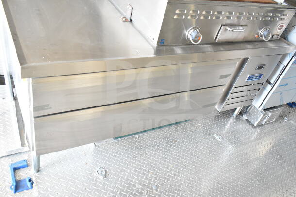 2020 Ford F59 Food Truck interior with stainless steel chef base and Arctic Air equipment in good condition.