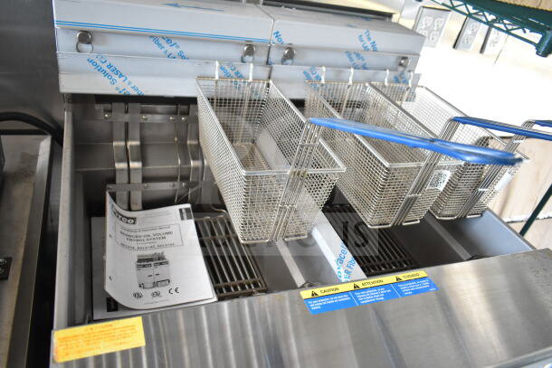 Pitco fryer inside 2020 Ford F59 food truck, featuring grease hood, suppression system, and chef base. Includes manual.