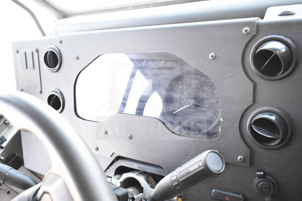 Dashboard of a 2020 Ford F59 food truck with visible speedometer and air vents.