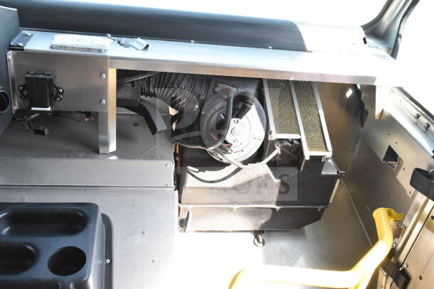 2020 Ford F59 food truck interior with grease hood, suppression system, Pitco fryer, and chef base. Visible VIN: 1F66F5KN8L0A07302.