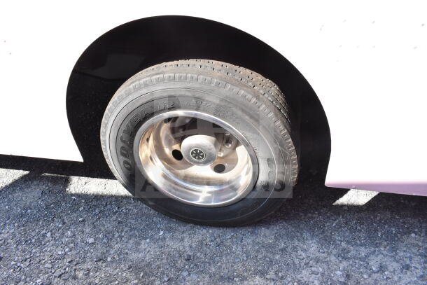 2020 Ford F59 food truck tire with Goodyear branding, part of auction item VIN 1F66F5KN8L0A07302.
