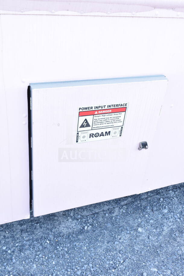2020 Ford F59 food truck power input interface panel, marked with warning label for high voltage.