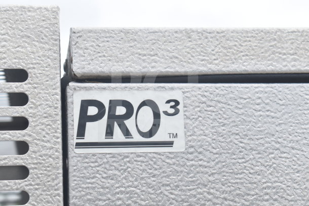 "PRO³" label on a textured metal surface of a 2020 Southern Dimensions gooseneck trailer.