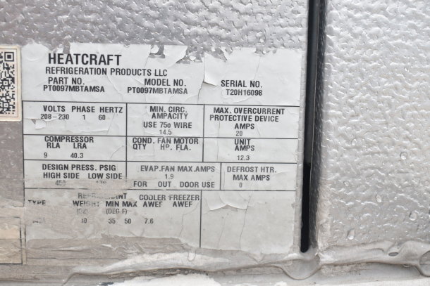 Close-up of a Heatcraft refrigeration label on a 2020 Southern Dimensions trailer. Model PT0097MBTAMSA, serial T20H16098.