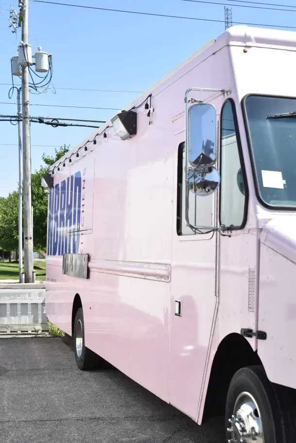 2020 Ford F59 food truck in new condition, pink exterior, all-electric equipment, odometer 3,428 miles, VIN 1F66F5KN8L0A07302.