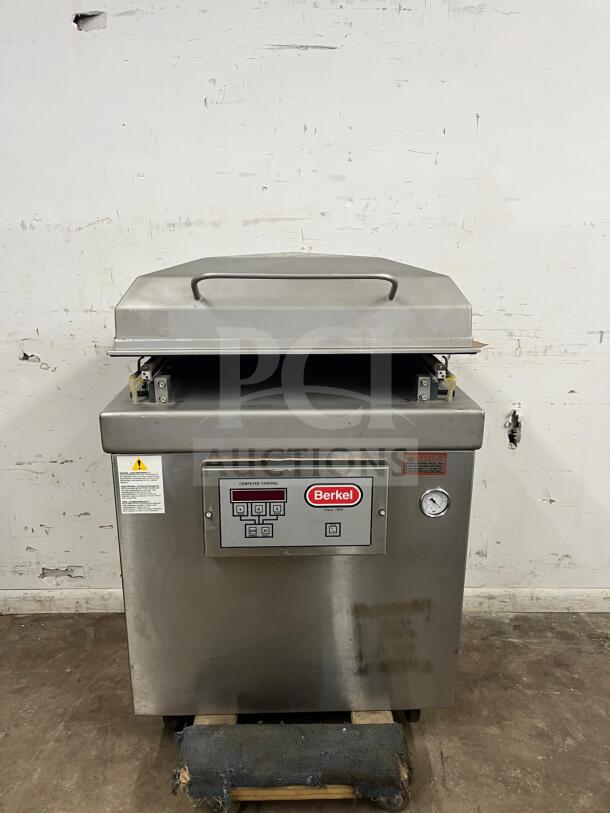 Berkel vacuum packaging machine, very good condition, stainless steel, digital controls, branded logo visible.