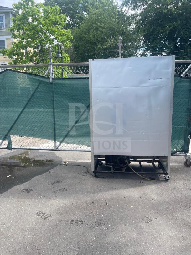 True T-49-HC 54" two-section reach-in refrigerator with solid doors, pictured in used condition, 115v power.