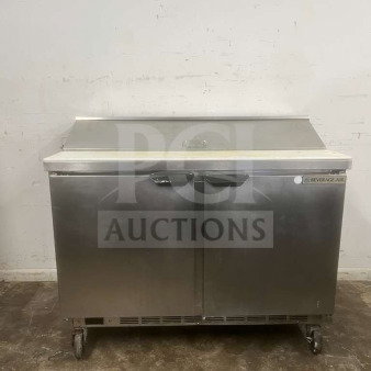 Beverage-Air 48" 2 Door Sandwich Prep Table in stainless steel, features dual doors, casters, and prep area. Good condition.