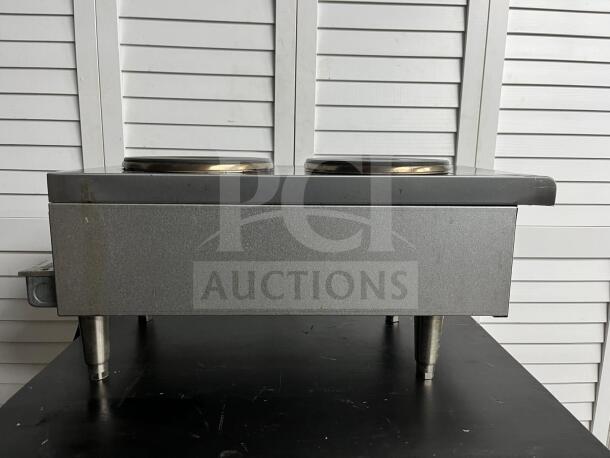 Starmax 602HF electric hot plate, 12", dual burners, durable metal body, well-maintained, ideal for commercial use.