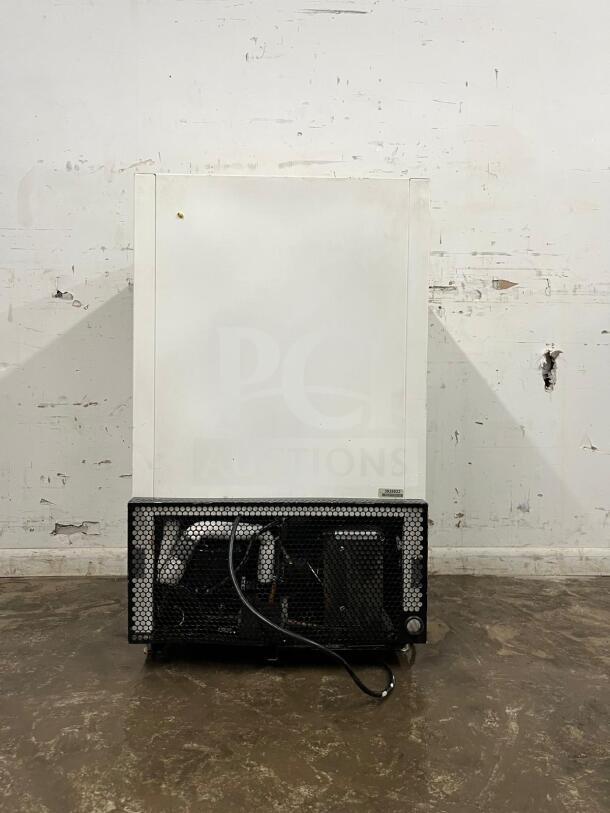 White countertop display ice cream freezer with glass door, in amazing condition. Model features visible cooling mechanism.