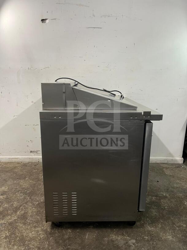 Kelvinator KCHMT48 48" prep table, stainless steel, refrigerated base, excellent condition, visible power cord.