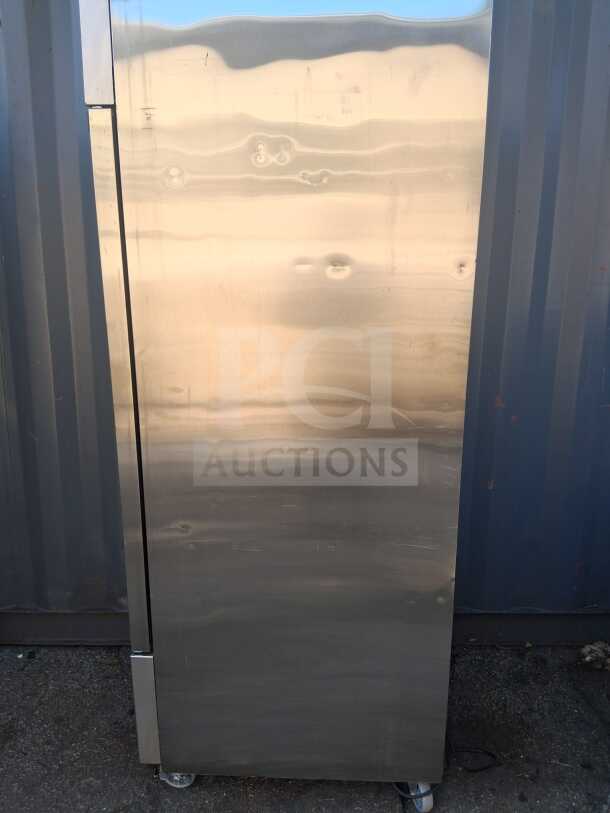DUKERS D28R 27.5" reach-in refrigerator, right-hinge solid door, stainless steel, visible cosmetic dents, 115v.