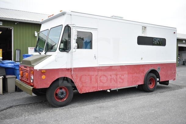 1993 GMC Step Van, VIN 1GDHP32K7R3500033, two-tone white and red, parked outdoors, showing moderate wear.