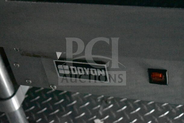 1993 GMC Step Van, VIN 1GDHP32K7R3500033, features sturdy build; includes visible Doyon equipment and industrial flooring.