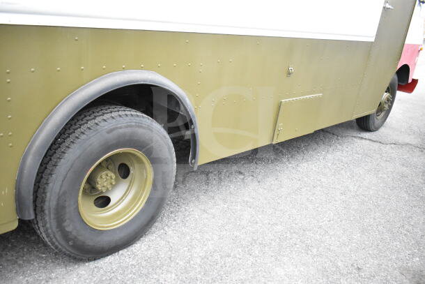 1993 GMC Step Van, olive green exterior, visible rivets, good condition, VIN 1GDHP32K7R3500033.
