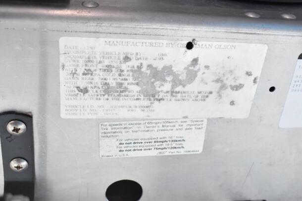 1993 GMC Step Van ID plate showing manufacturing details, VIN 1GDHP32K7R3500033, and tire specifications.