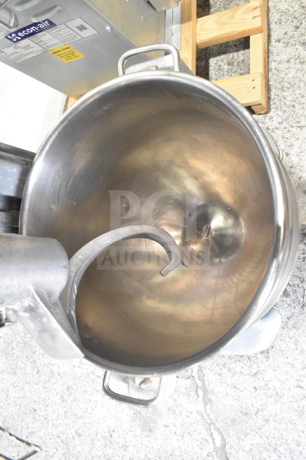 Hobart Legacy HL600 60-quart dough mixer with mixing bowl and dough hook. Visible mixer label, used condition.