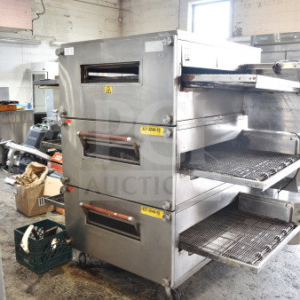 XLT XLT3240-TS conveyor pizza oven, natural gas, commercial casters, 100,000 BTU, used condition, with visible branding.