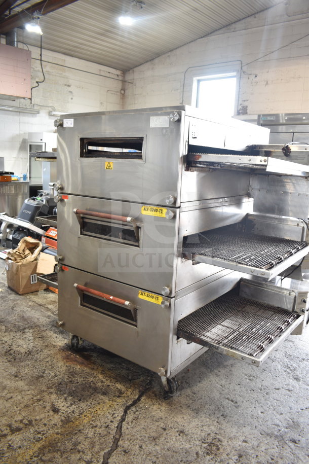 3 XLT XLT3240-TS commercial conveyor pizza ovens, natural gas-powered, 100,000 BTU, on casters, in good condition.