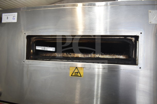 XLT XLT3240-TS commercial natural gas conveyor pizza oven with visible wear, caution label, and auction tag. 100,000 BTU.