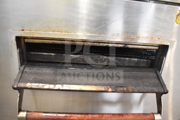 3 XLT XLT3240-TS commercial natural gas conveyor pizza oven, used condition, on commercial casters, 100,000 BTU.