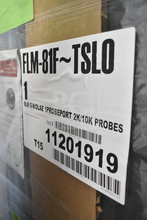 True FLM-81F commercial freezer, brand new scratch and dent. Features 81" glass door. Visible label with item details.