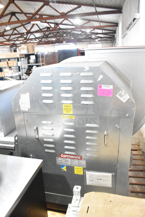 CaptiveAire USBI30BDHP-RM commercial power ventilator/exhaust fan in good condition, labeled with model and safety instructions.