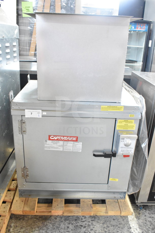 CaptiveAire A1-G10 commercial ventilator, stainless steel, on pallet. Features control box, model and technical labels visible.