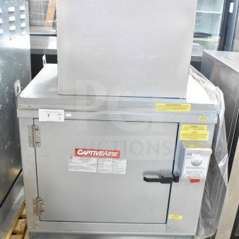 CaptiveAire A1-G10 commercial ventilator, stainless steel, on pallet. Features control box, model and technical labels visible.