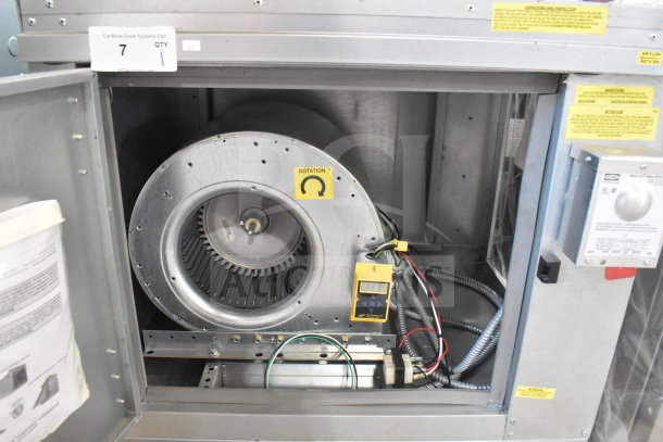 CaptiveAire A1-G10 commercial power ventilator, showing fan unit and wiring. Tags display rotation direction. Good condition.