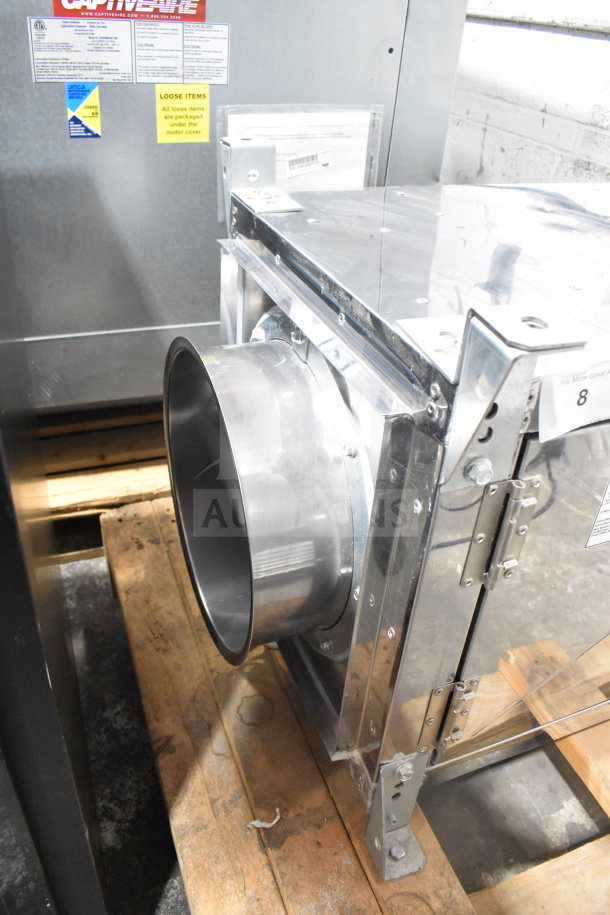CaptiveAire SIF11DD-SS power ventilator, 115V, 1 phase, stainless steel, mounted on wooden pallet, visible safety labels.