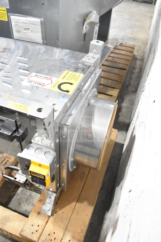 CaptiveAire SIF11DD-SS power ventilator in stainless steel, 115V, 1 phase, with air flow direction labels. Mounted on a pallet.