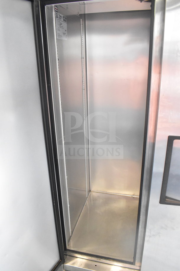 2018 True T-35-HC 2-door commercial cooler, 115V, 1 phase. Stainless interior, model label visible, clean condition.