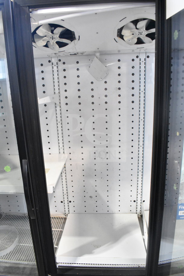 2019 True FLM-81F Glass Door Freezer, 81", commercial model, full-length door, visible fans, good condition.