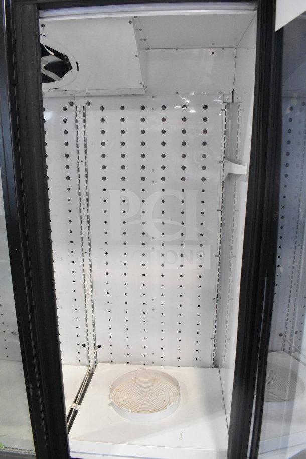 2019 True FLM-81F commercial 81" glass door freezer merchandiser; spacious interior, sturdy construction, excellent condition.