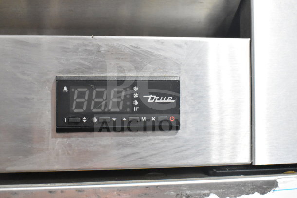 2022 True T-19F-HC commercial freezer control panel, stainless steel. Digital display with "True" branding.